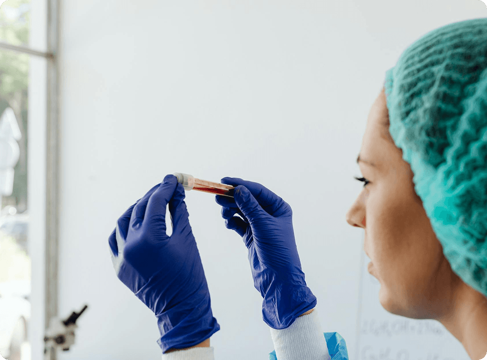 Lab professional examining sample